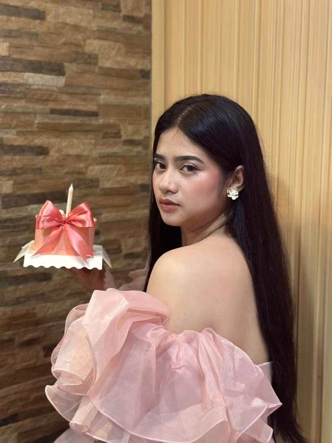 Tala in a pink dress